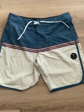VISSLA Teal and Cream Colorblock Boardshorts with Maroon Stripe